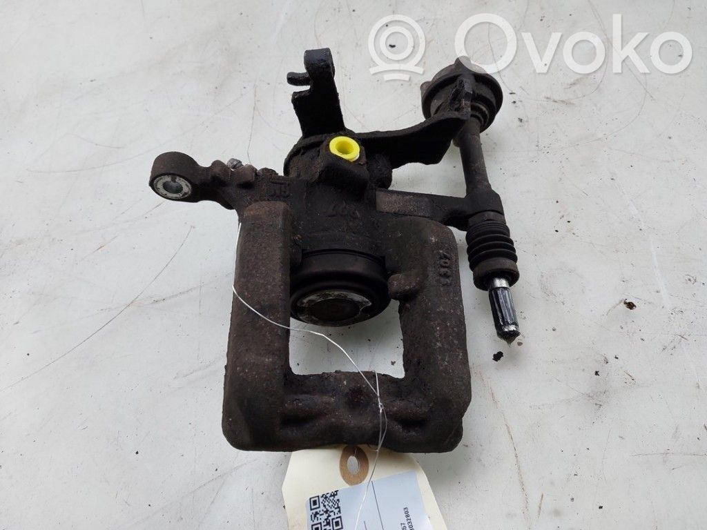 Opel Astra J Tylny zacisk hamulcowy 