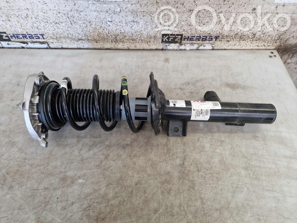 Cupra Born Front shock absorber with coil spring 