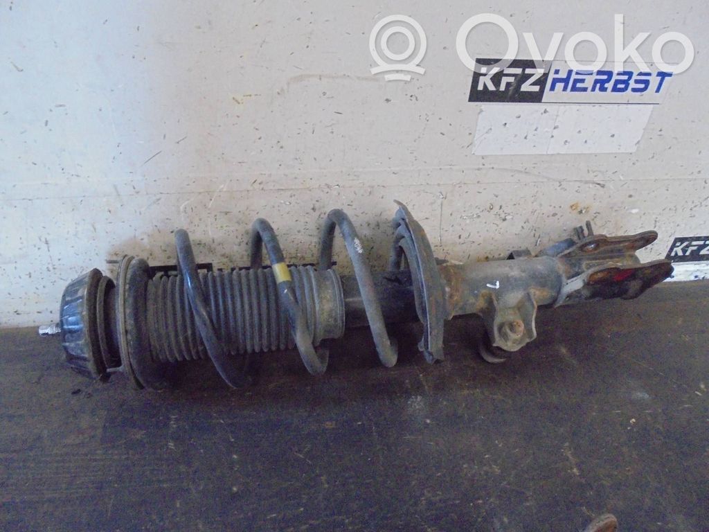 KIA Rio Amortyzator osi przedniej ze sprężyną 