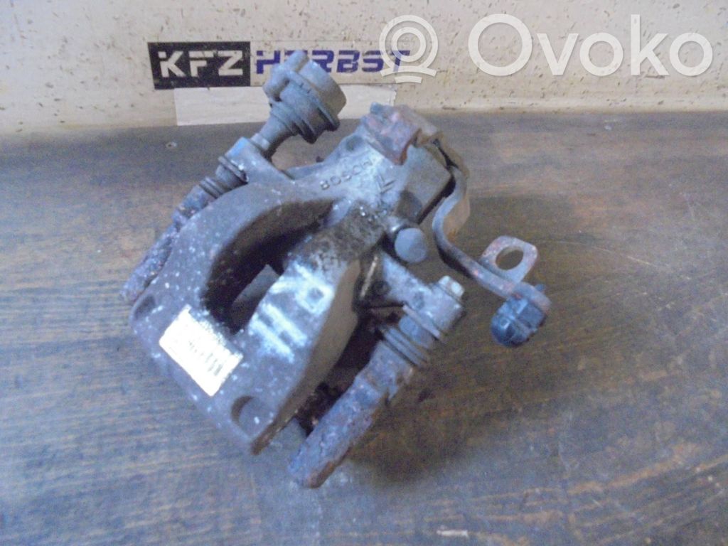 Citroen C4 I Picasso Tylny zacisk hamulcowy 