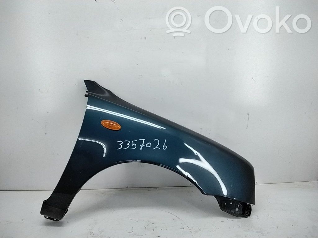 Nissan Micra Błotnik przedni 