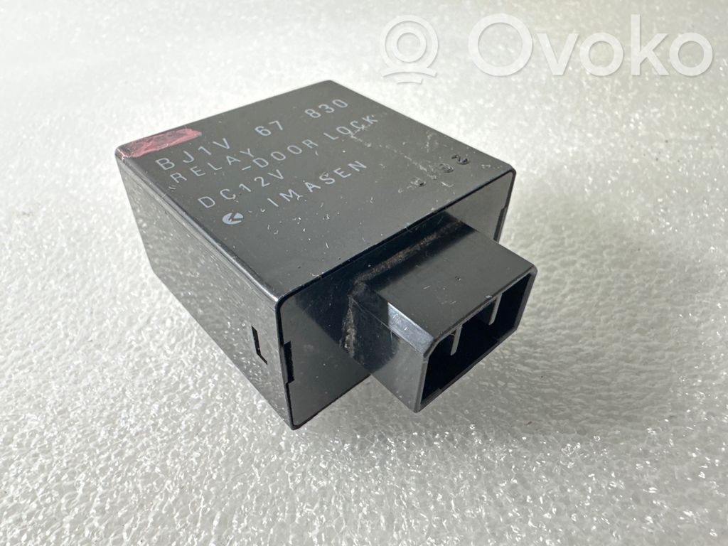 Mazda 323 F Door control unit/module 