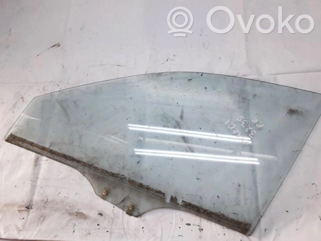 Mazda 323 Geam ușă față patru uși 
