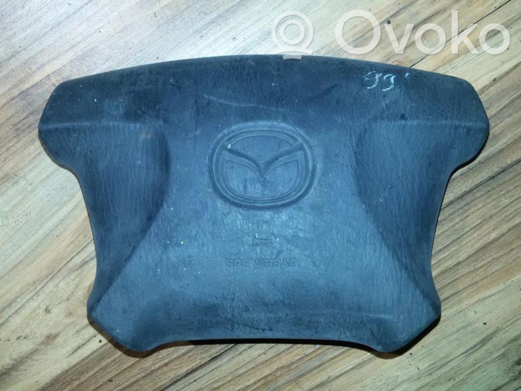 Mazda 323 Vairo oro pagalvė 