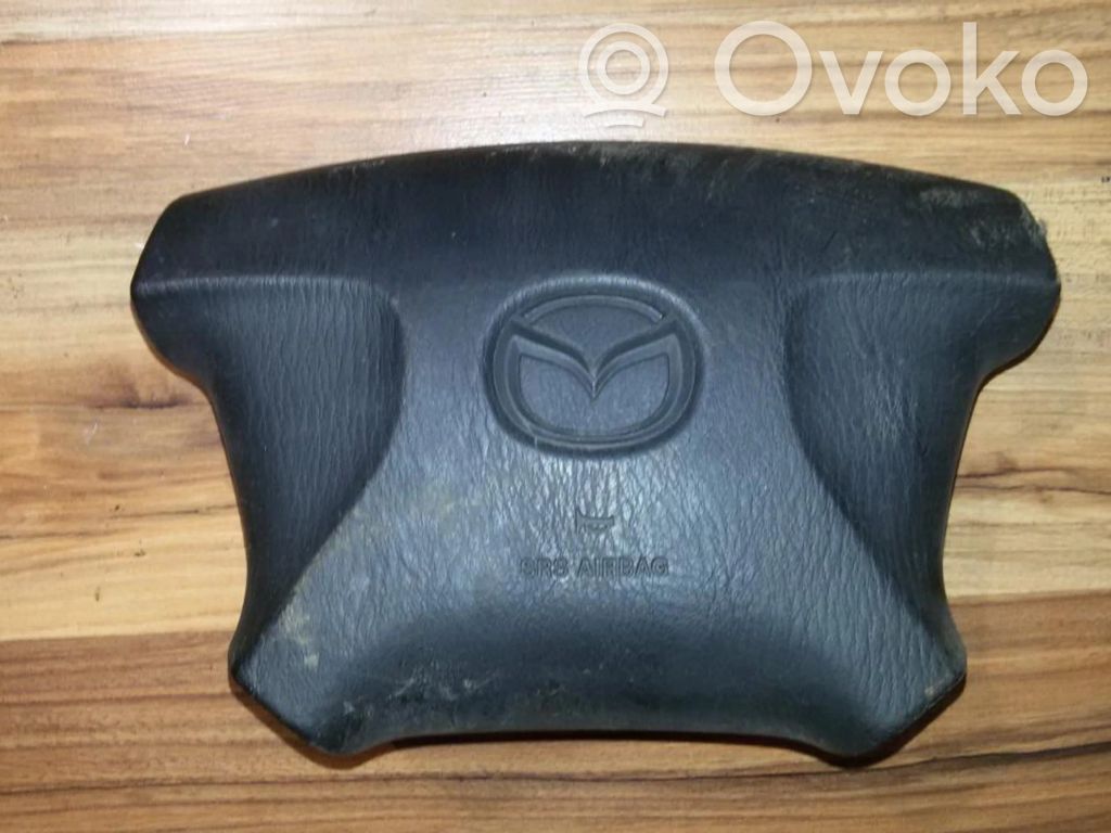 Mazda 323 Vairo oro pagalvė 