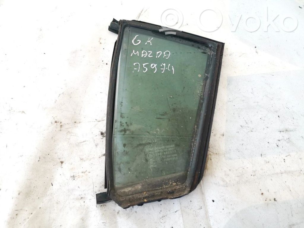 Mazda 3 I Ventanilla de ventilación de la puerta trasera 
