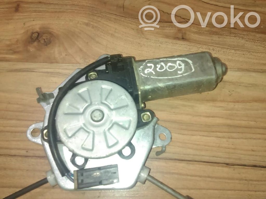Nissan Almera Silnik regulatora szyby drzwi przednich 