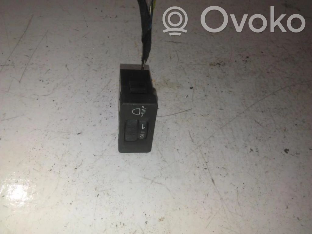 Headlight level height control switch