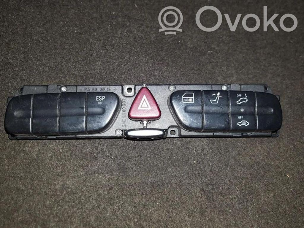 Botón interruptor de bloqueo de puertas