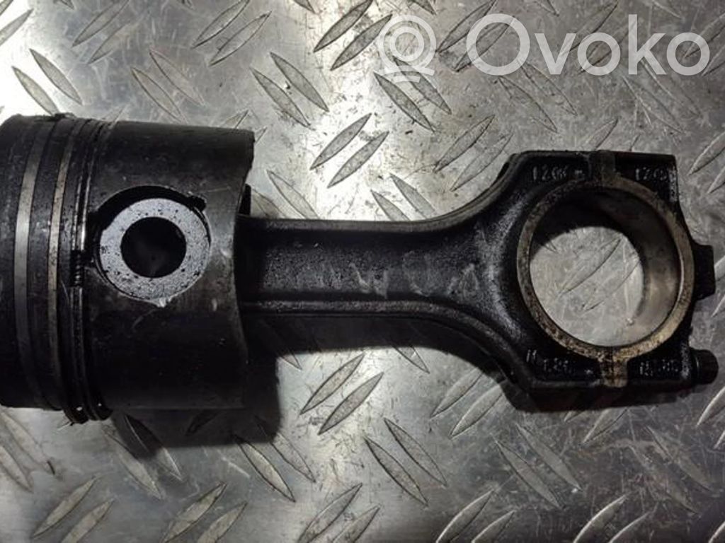Piston with connecting rod