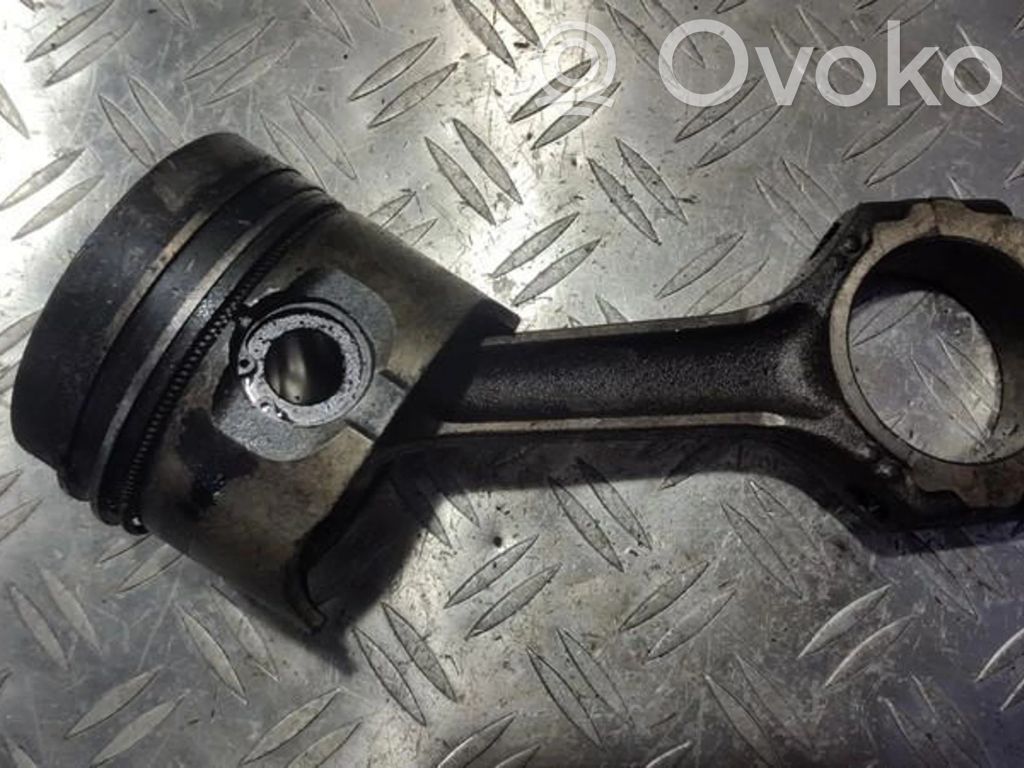 Piston with connecting rod