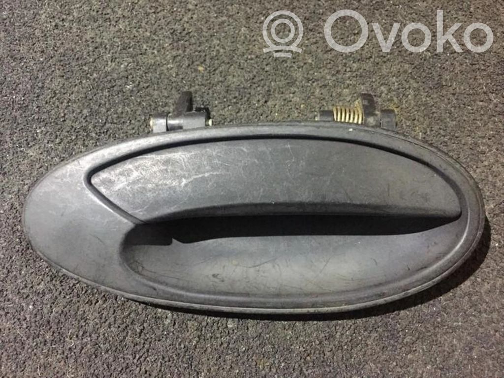Mitsubishi Lancer Manecilla externa puerta delantera 