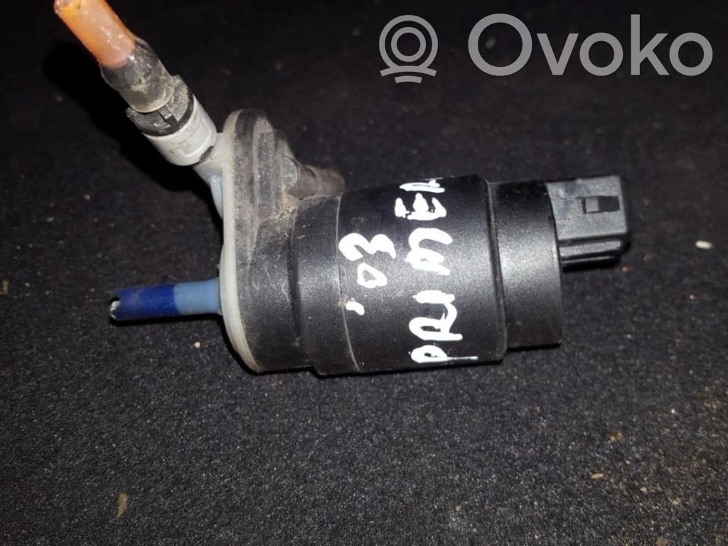Nissan Primera Pompa spryskiwacza szyby przedniej / czołowej 