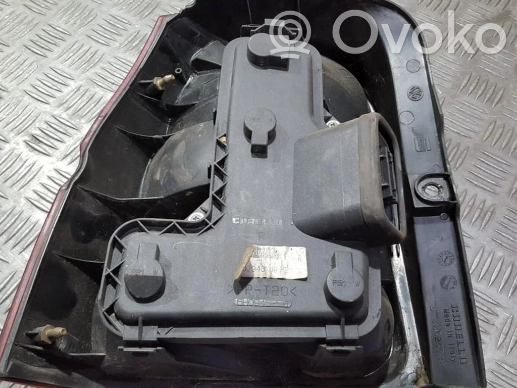 Volkswagen Lupo Takavalon polttimon suojan pidike 