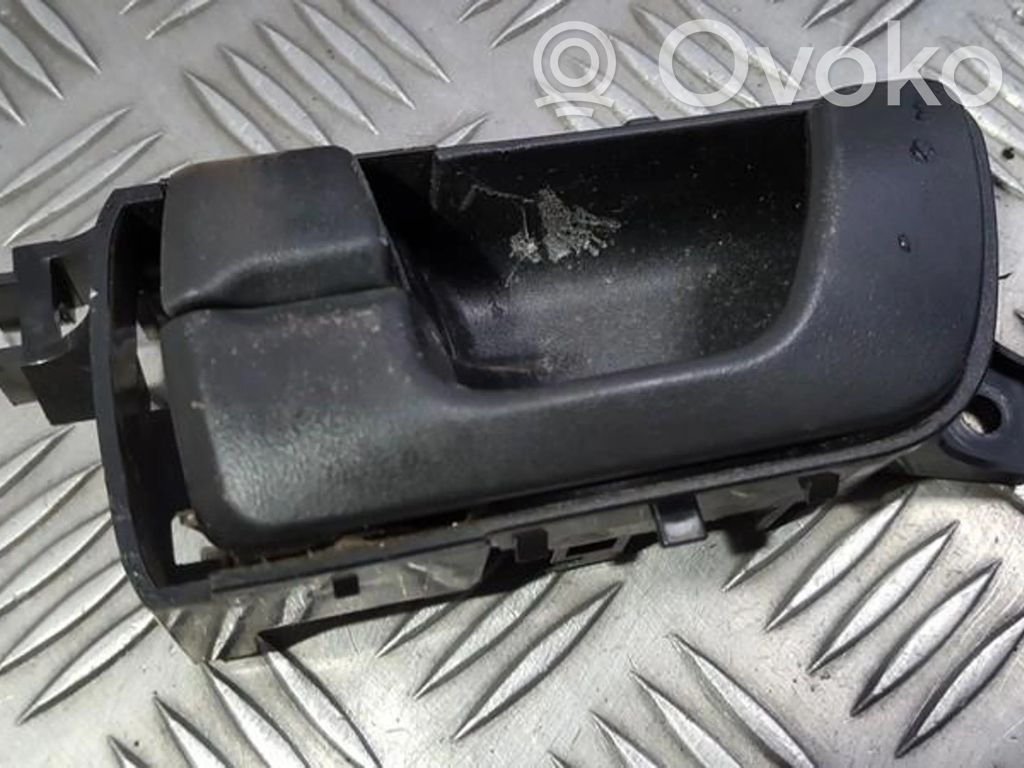 Mitsubishi Pajero Manecilla interna puerta delantera 