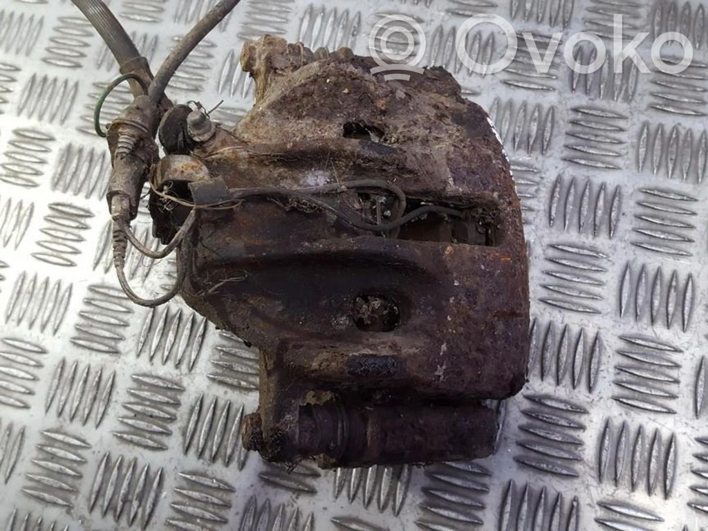 Caliper de freno delantero