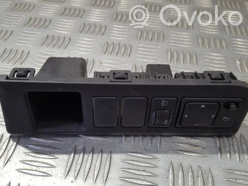 Nissan Note (E11) Bouton commande réglage hauteur de phares 