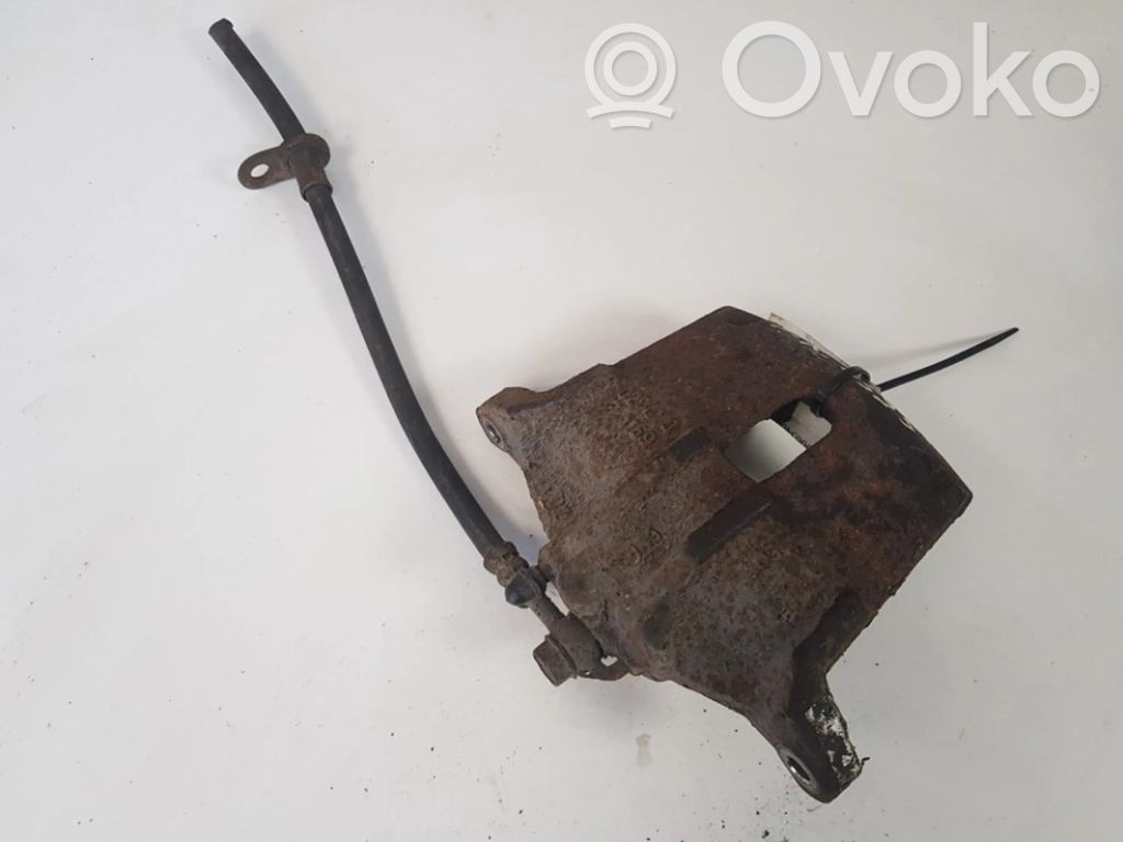 Toyota Yaris Zacisk hamulcowy przedni 