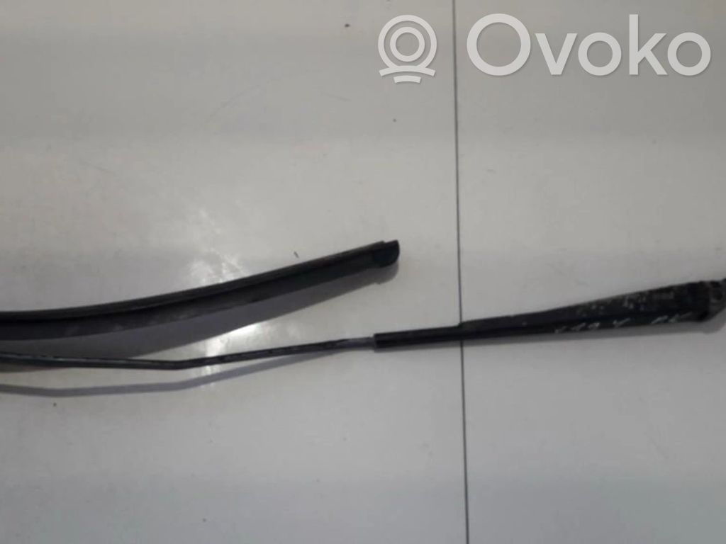 Front wiper blade arm