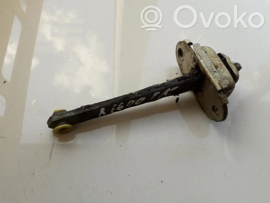 Tope freno de puerta delantera