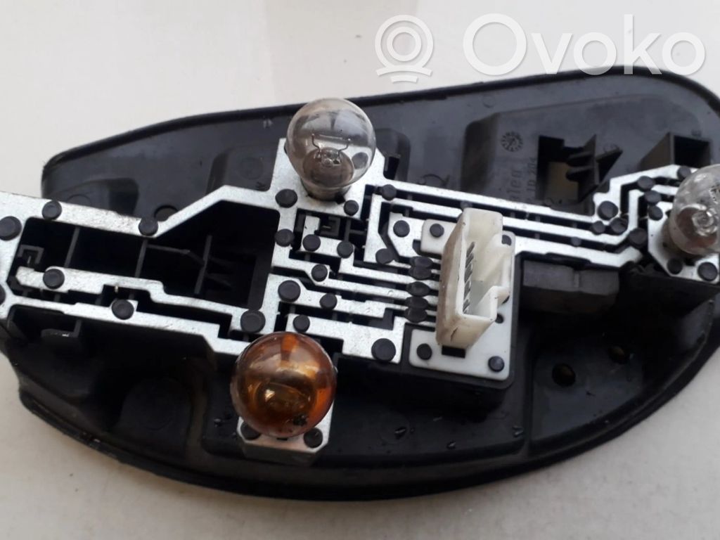 Citroen C5 Takavalon polttimon suojan pidike 