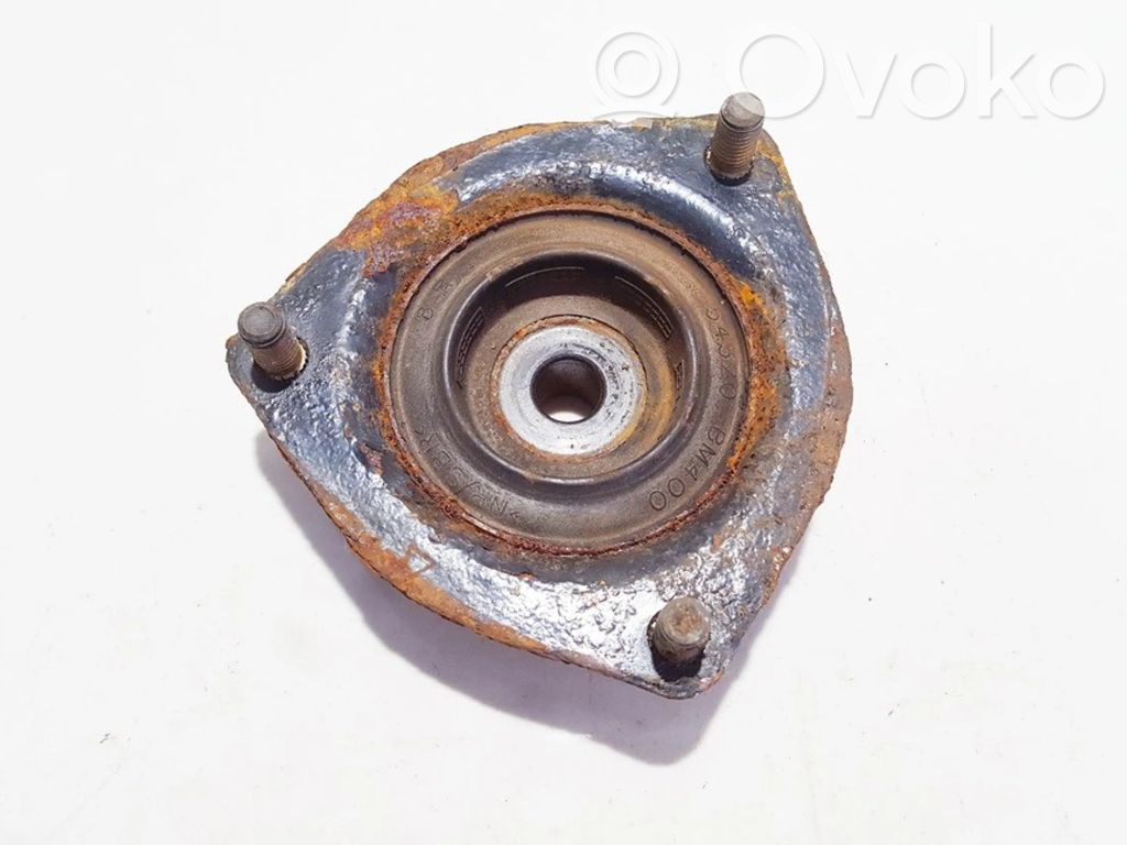 Nissan Almera N16 Supporto di montaggio della molla elicoidale