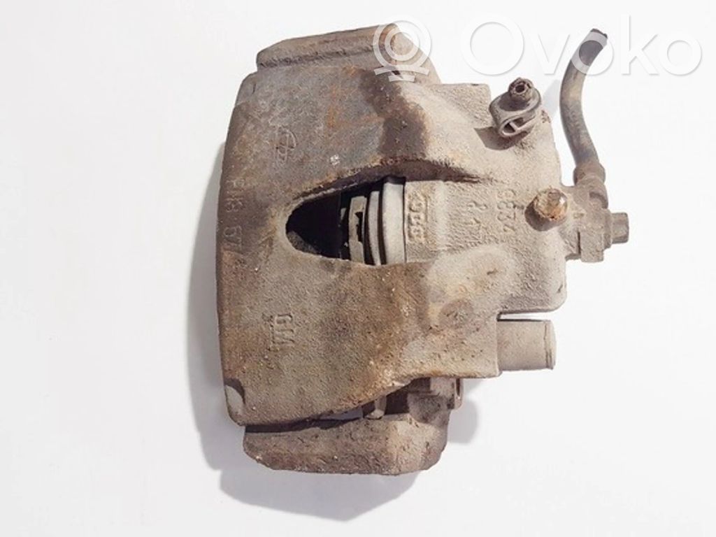 Opel Astra G Zacisk hamulcowy przedni 