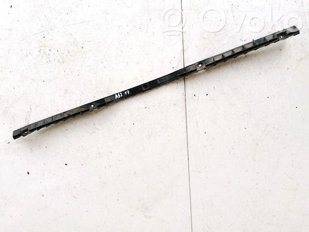 Volkswagen PASSAT B5 Uchwyt / Mocowanie zderzaka tylnego 