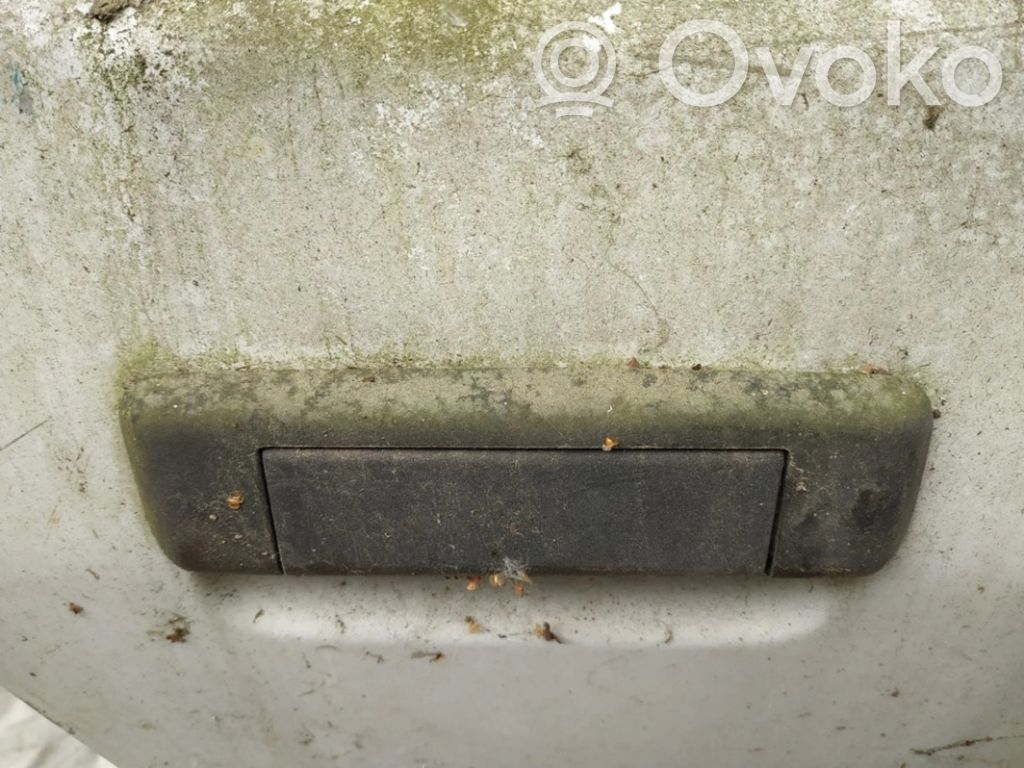 Manecilla externa puerta delantera
