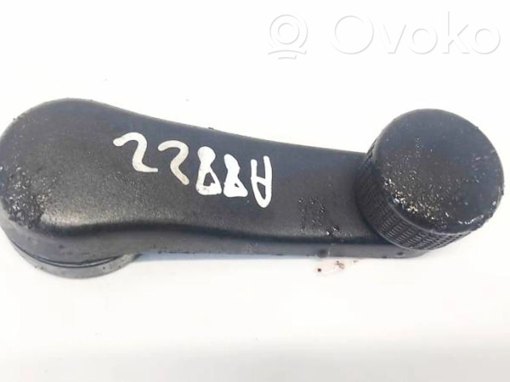 Volkswagen Golf IV Manovella finestrino della portiera anteriore