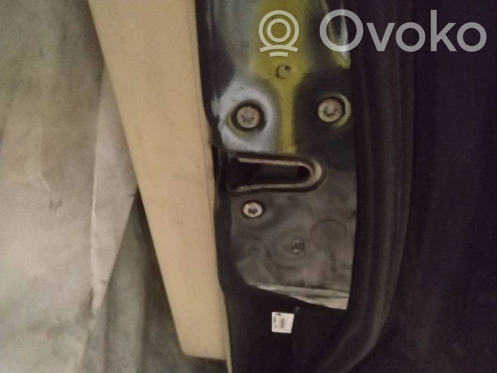 Cerradura de puerta trasera