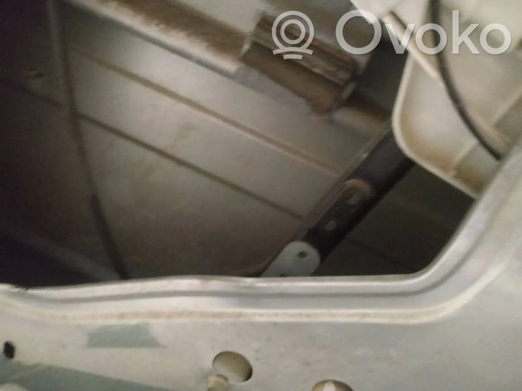 Regulador con motor de la ventanilla de la puerta corredera