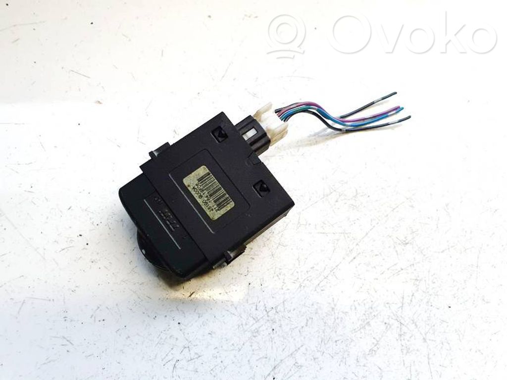 Nissan Note (E11) Interruttore di regolazione livello altezza dei fari