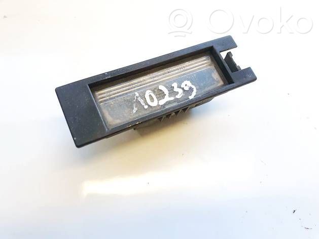 Opel Zafira B Lampa oświetlenia tylnej tablicy rejestracyjnej 