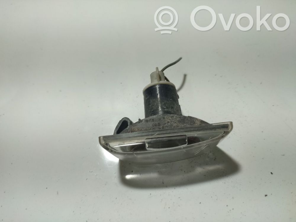 Opel Astra H Indicatore di direzione del parafango anteriore 