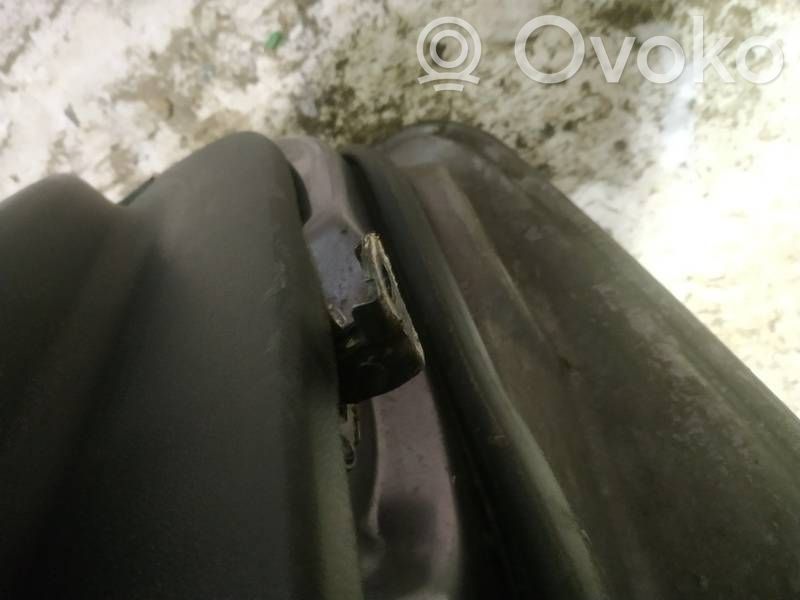 Front door check strap stopper