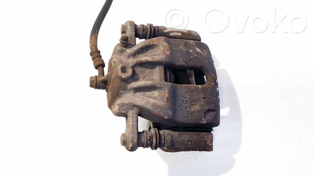 Nissan Micra K14 Zacisk hamulcowy przedni 
