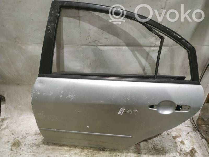 Mazda 6 Rear door