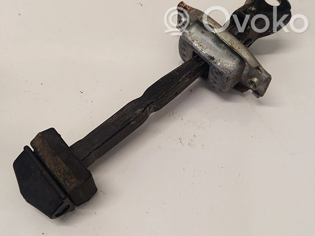 Tope freno de puerta delantera