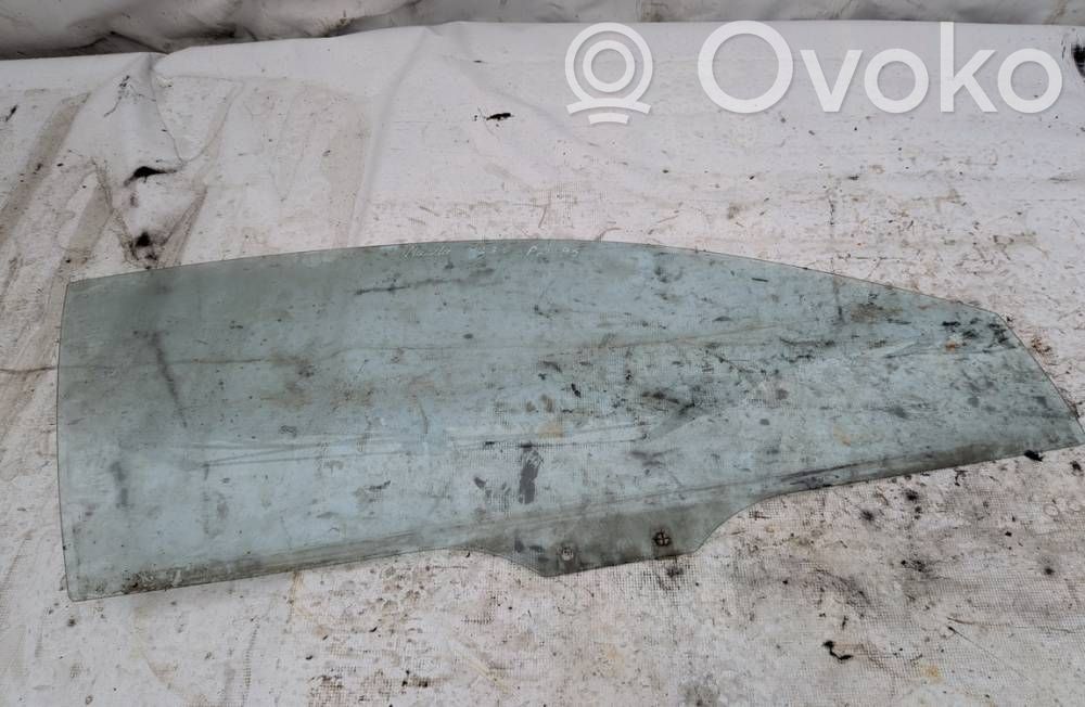 Mazda 323 Geam ușă față patru uși 