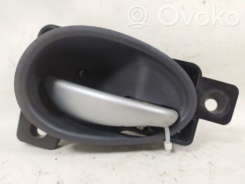 Ford Puma Poignée inférieure de porte avant 