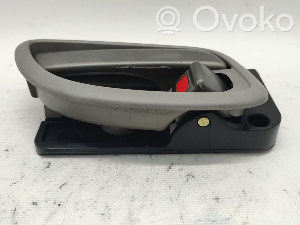 KIA Carens II Maniglia interna per portiera anteriore 