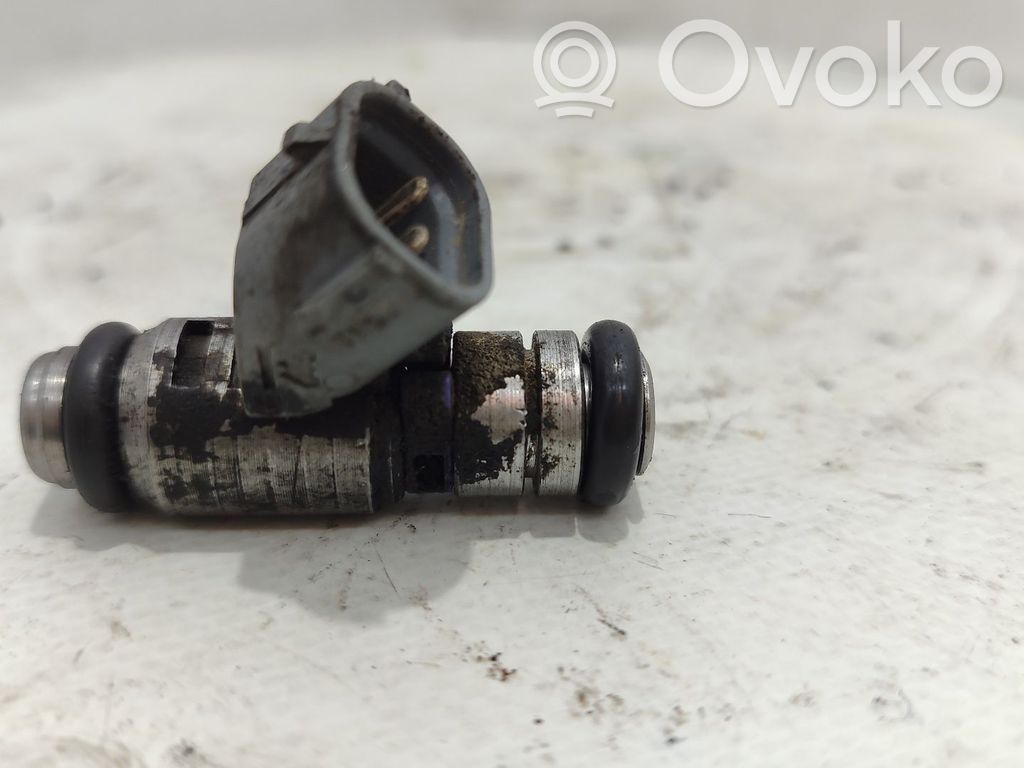 Inyector de combustible