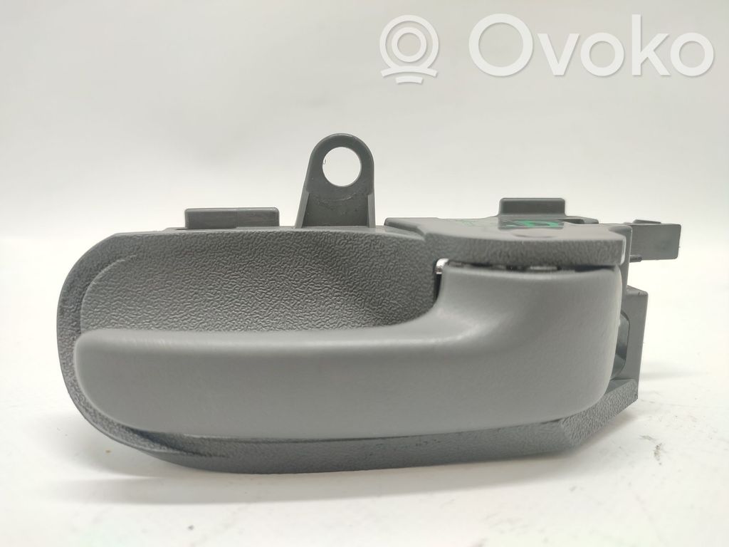Manecilla interna puerta delantera   9143K8,ABS7930