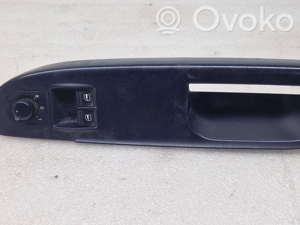 Volkswagen PASSAT B6 Ramă comutator geam ușă față 