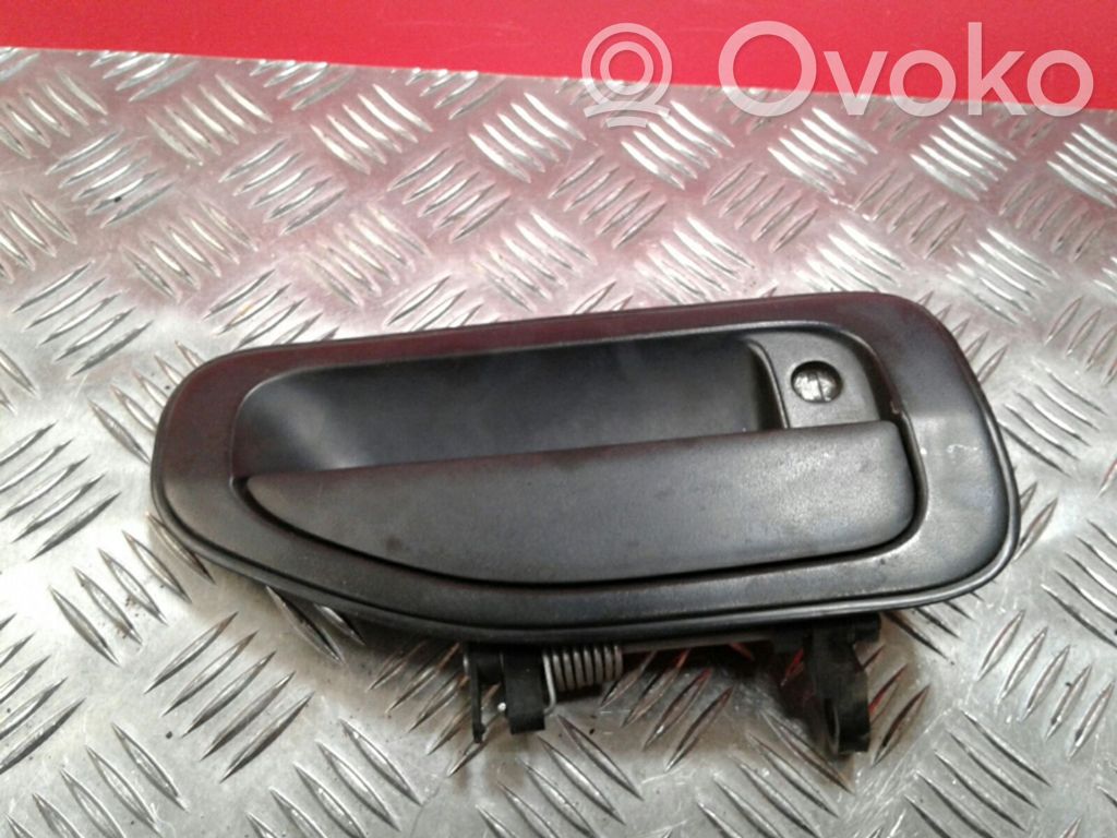 Manecilla externa puerta delantera