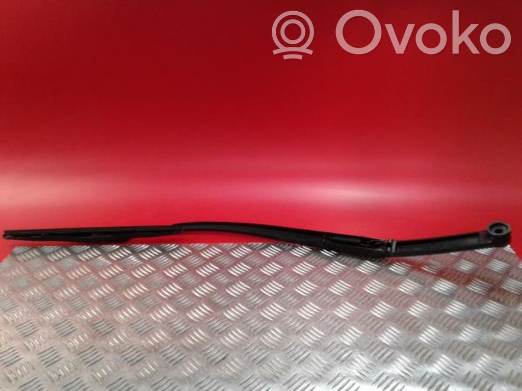 Front wiper blade arm