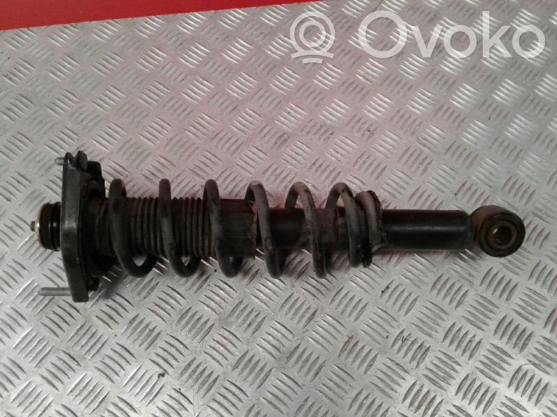 Toyota Corolla E120 E130 Задний aмортизатор 