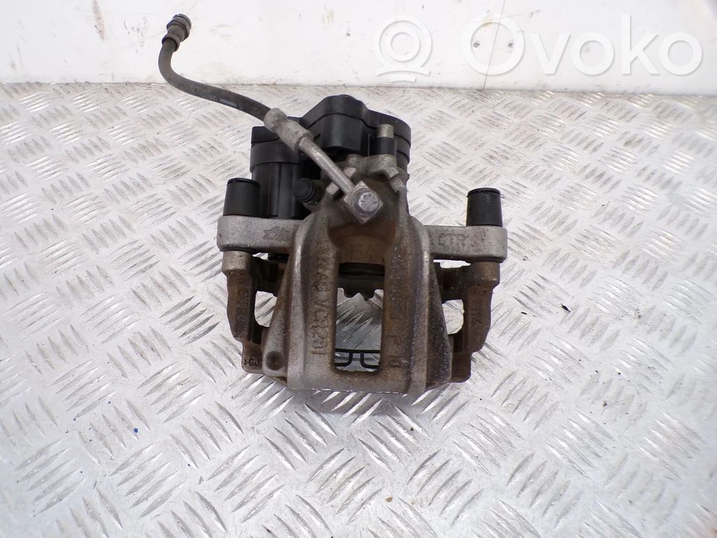 Skoda Octavia Mk4 Tylny zacisk hamulcowy 