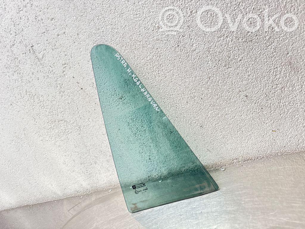 Opel Astra H Ventanilla de ventilación de la puerta trasera 